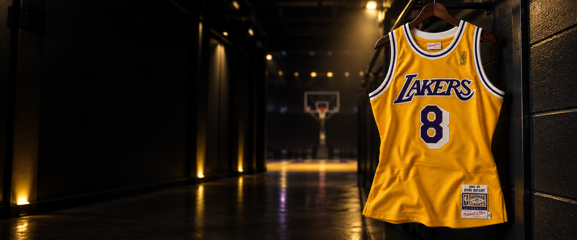 Gold Los Angeles Lakers #8 basketball jersey in a dark arena tunnel