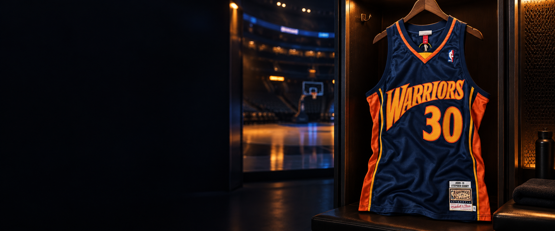 Navy Golden State Warriors #30 basketball jersey in a dark arena locker room