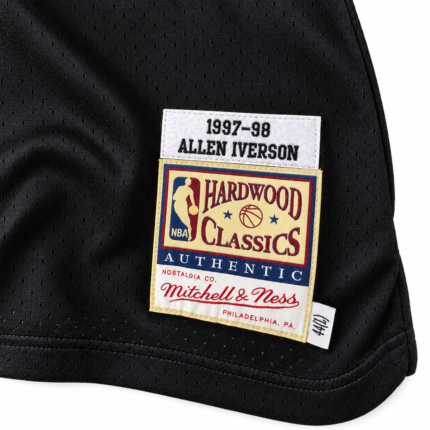 Close-up of Allen Iverson 76ers 1997-98 black jersey detail and stitching