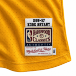 Close-up of Kobe Bryant Lakers 1996-97 gold jersey woven Hardwood Classics hem tag