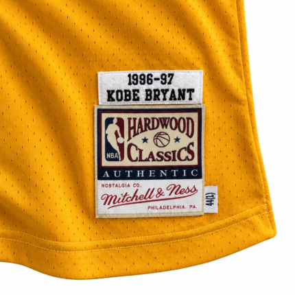 Close-up of Kobe Bryant Lakers 1996-97 gold jersey woven Hardwood Classics hem tag