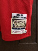 Michael Jordan Bulls 1984–85 rookie red jersey, actual size L sample photo