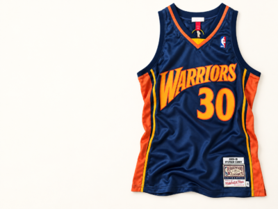 Navy Golden State Warriors #30 Stephen Curry basketball jersey on an ivory studio background